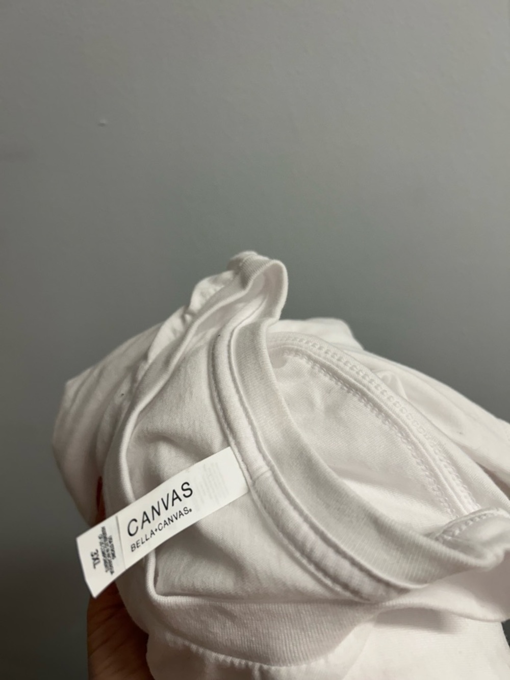 poshmark poshfest t shirt, stickers roll, and measuring tape